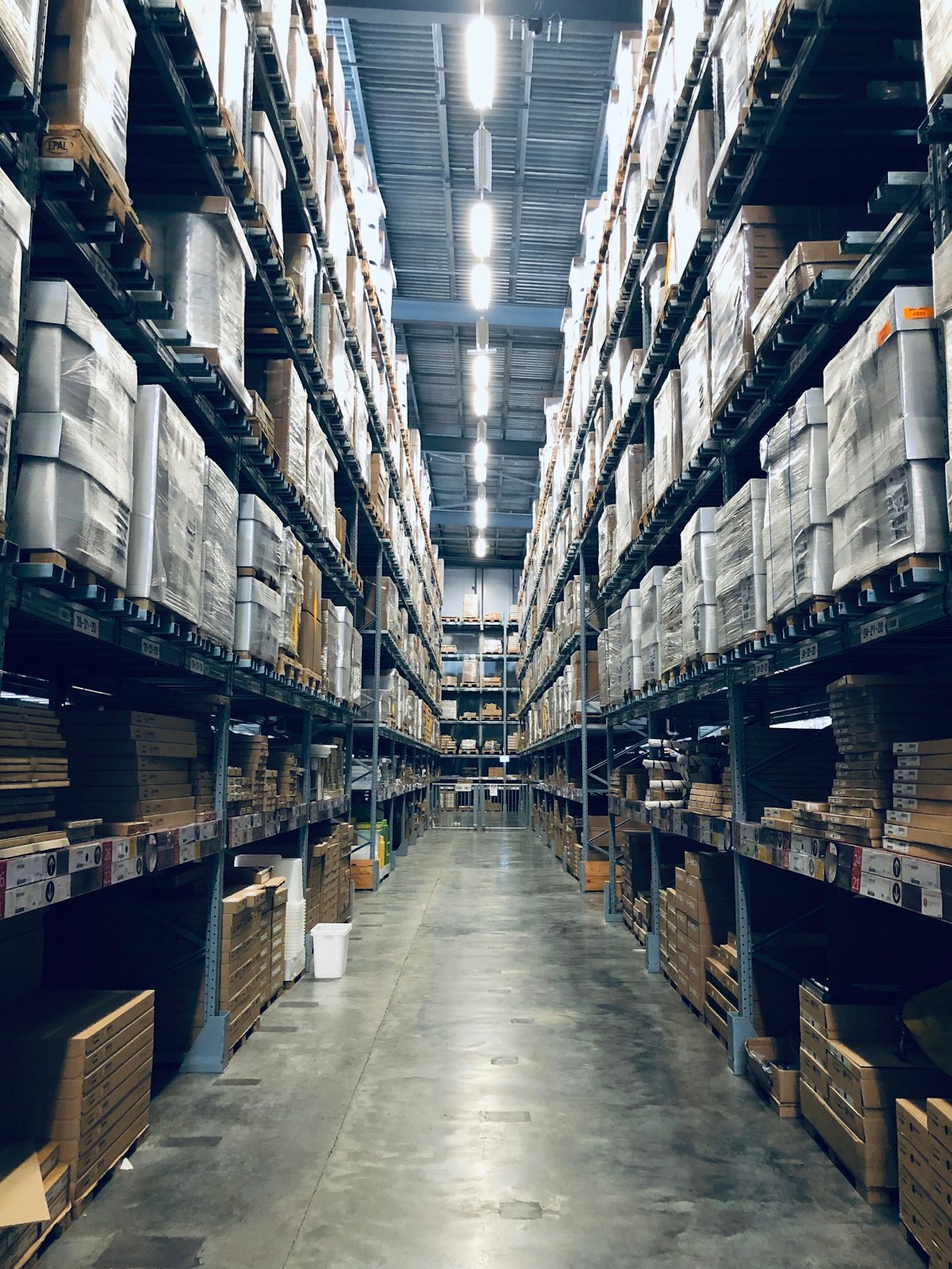 Warehouse aisle with racked cartons
